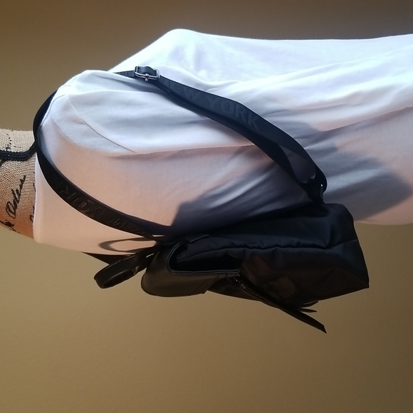 BOTKIIER SMALL NYLON AND PEBBLED LEATHER BACKPACK WITH LOGO STRAPS - Picture 2 of 8